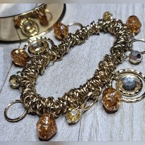 Gold cuff and charm bracelets 2 in 1